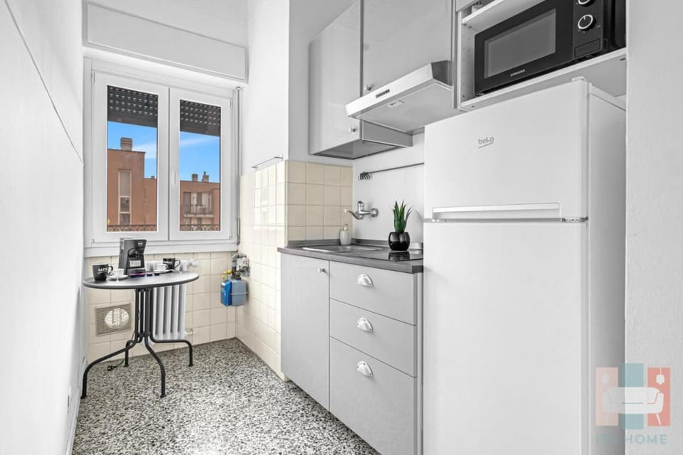 Kitchen or kitchenette, stove