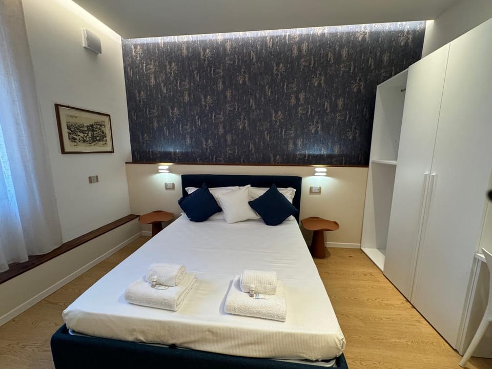 Bed, Photo of the whole room, Bedroom, towels, wardrobe