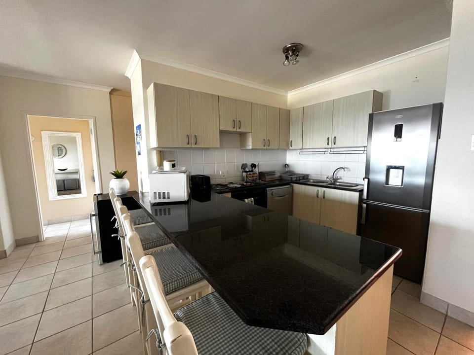 Seating area, dishwasher, microwave, toaster, kitchen