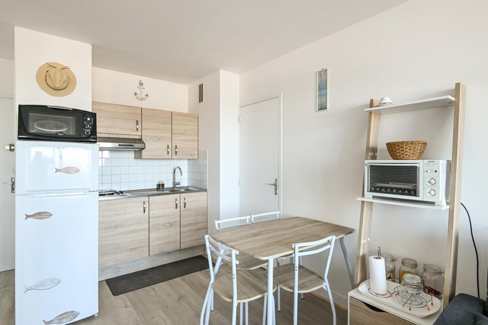 Kitchen or kitchenette, stove