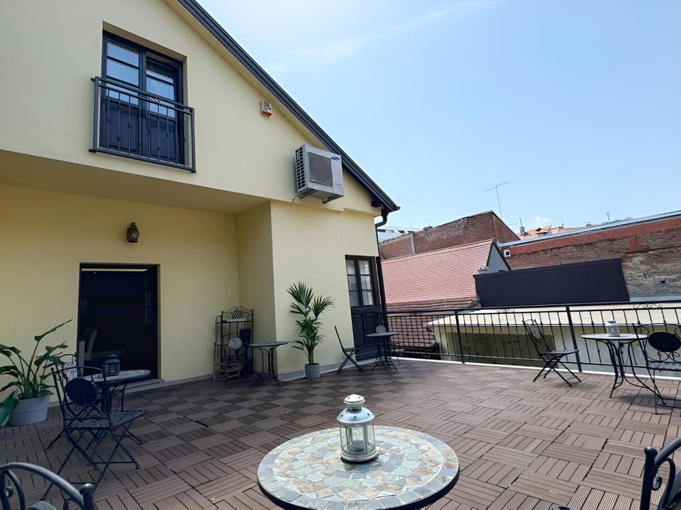 Property building, Balcony/Terrace, Seating area, air conditioner