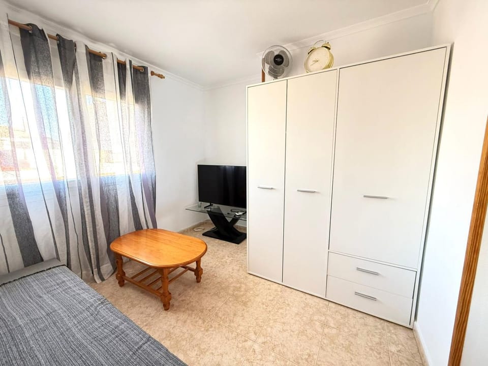 Communal lounge/ TV room, TV and multimedia, Living room, Photo of the whole room, Seating area, wardrobe