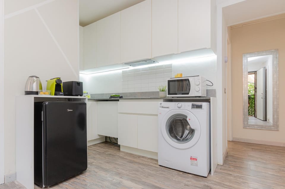 Kitchen or kitchenette, microwave, washing machine, kitchen