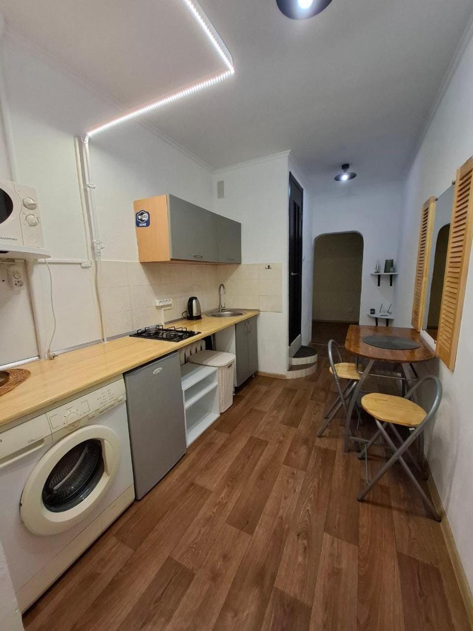 Kitchen or kitchenette, Living room, Dining area, stove, washing machine