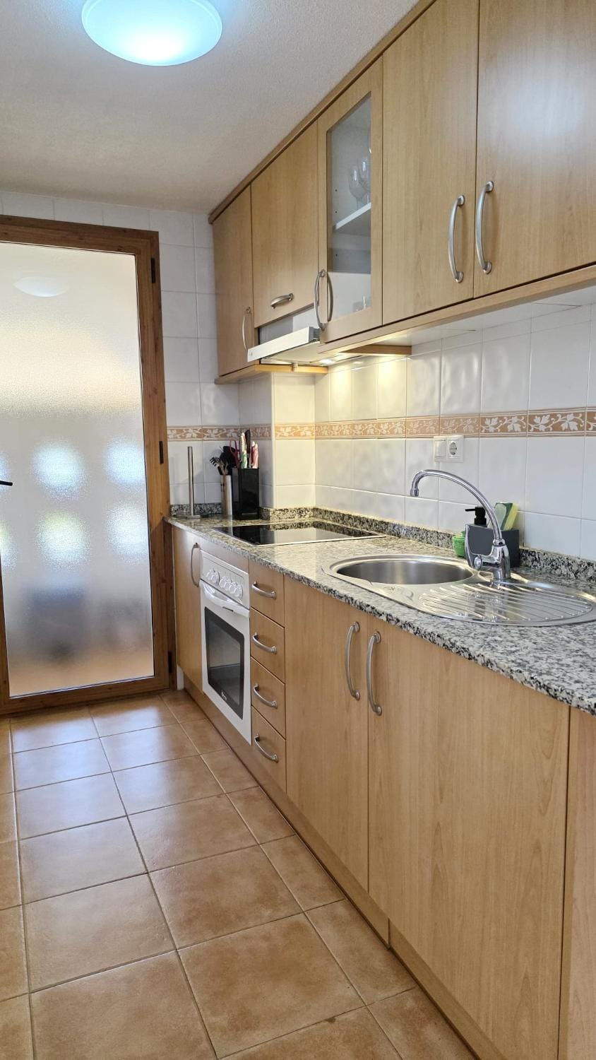 Kitchen or kitchenette, oven, stove
