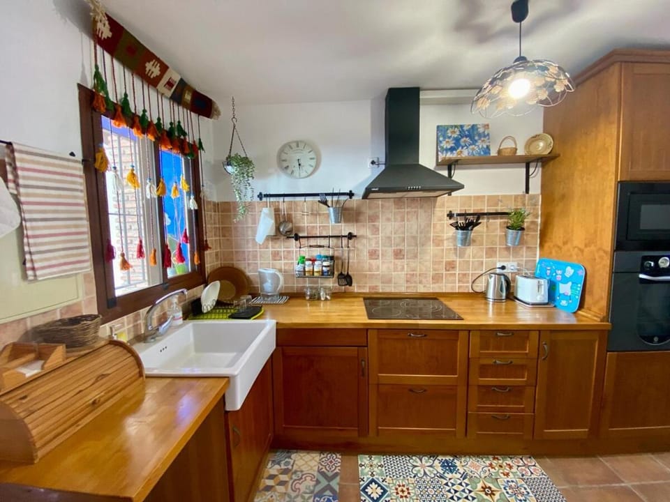 Kitchen or kitchenette, oven, stove, toaster
