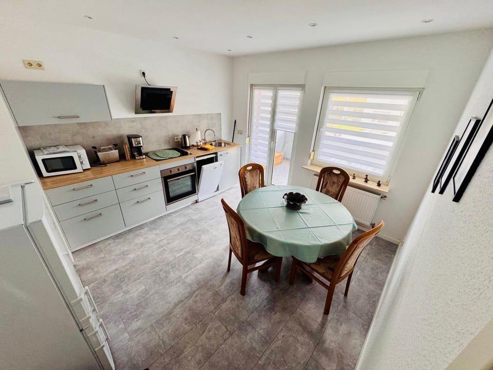 Kitchen or kitchenette, Seating area, Dining area, dishwasher, oven, stove, toaster