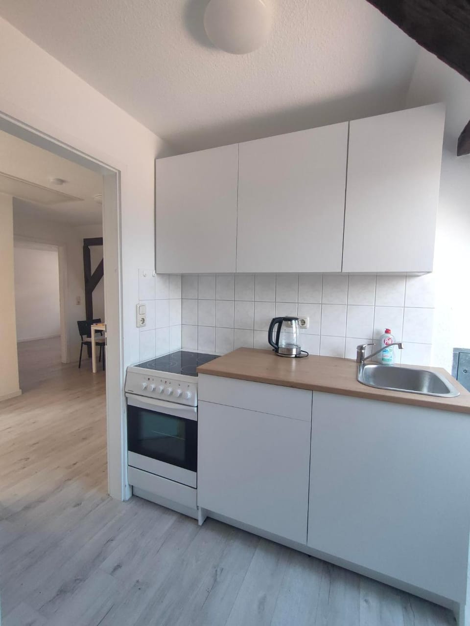 Kitchen or kitchenette, stove, toaster