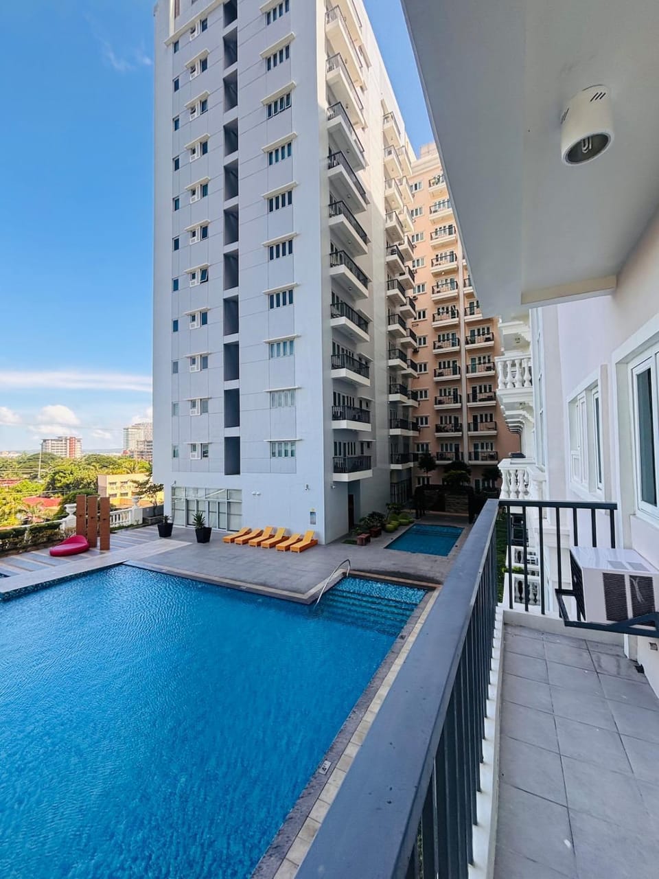 11 Poolside Balcony Bliss Apartment in Iloilo City