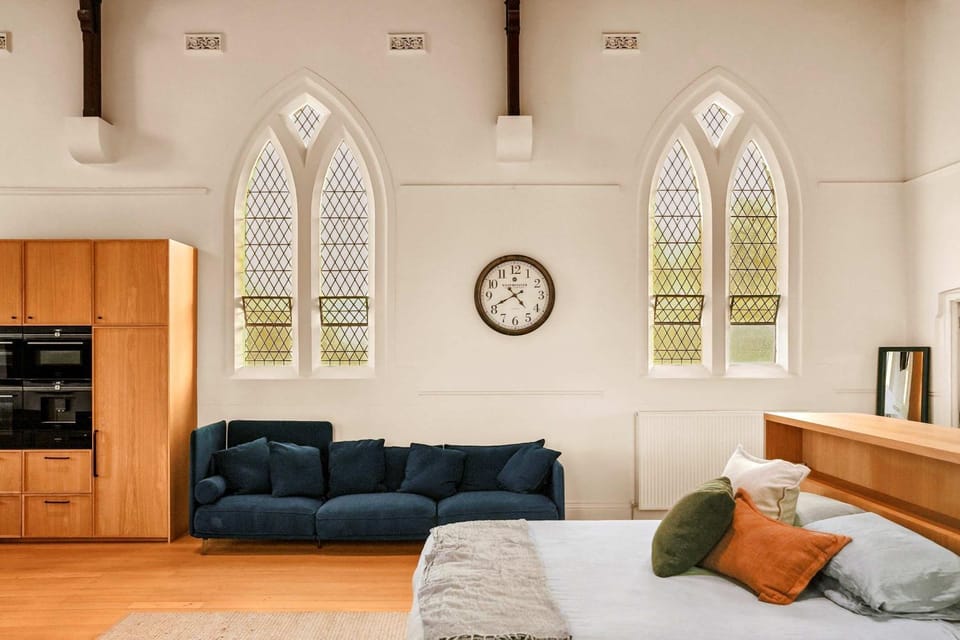 Bed, Kitchen or kitchenette, Seating area
