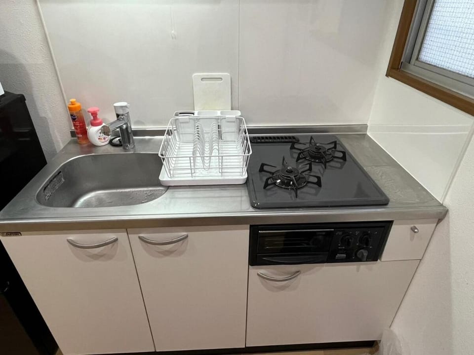 Kitchen or kitchenette, stove