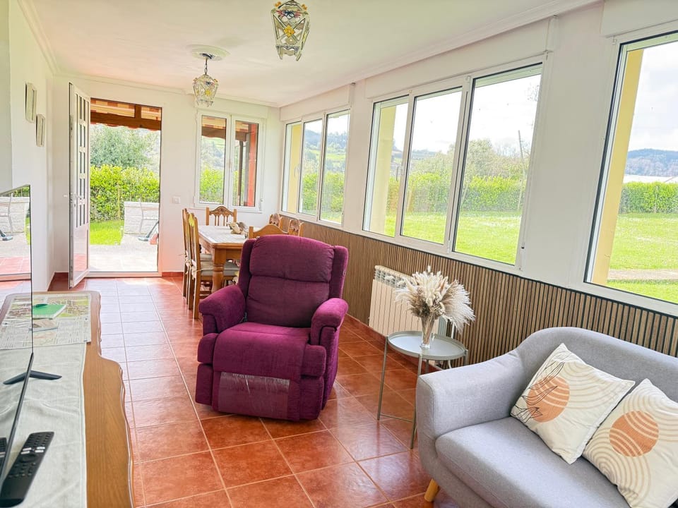 Patio, Living room, Seating area, Dining area, Garden view