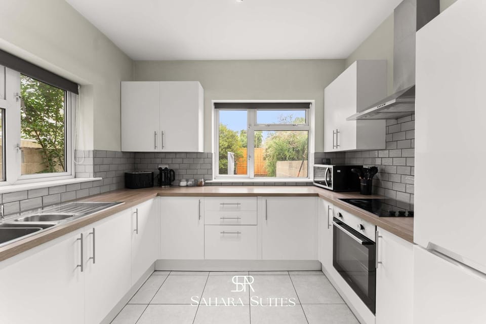 Kitchen or kitchenette, microwave, oven, stove, toaster