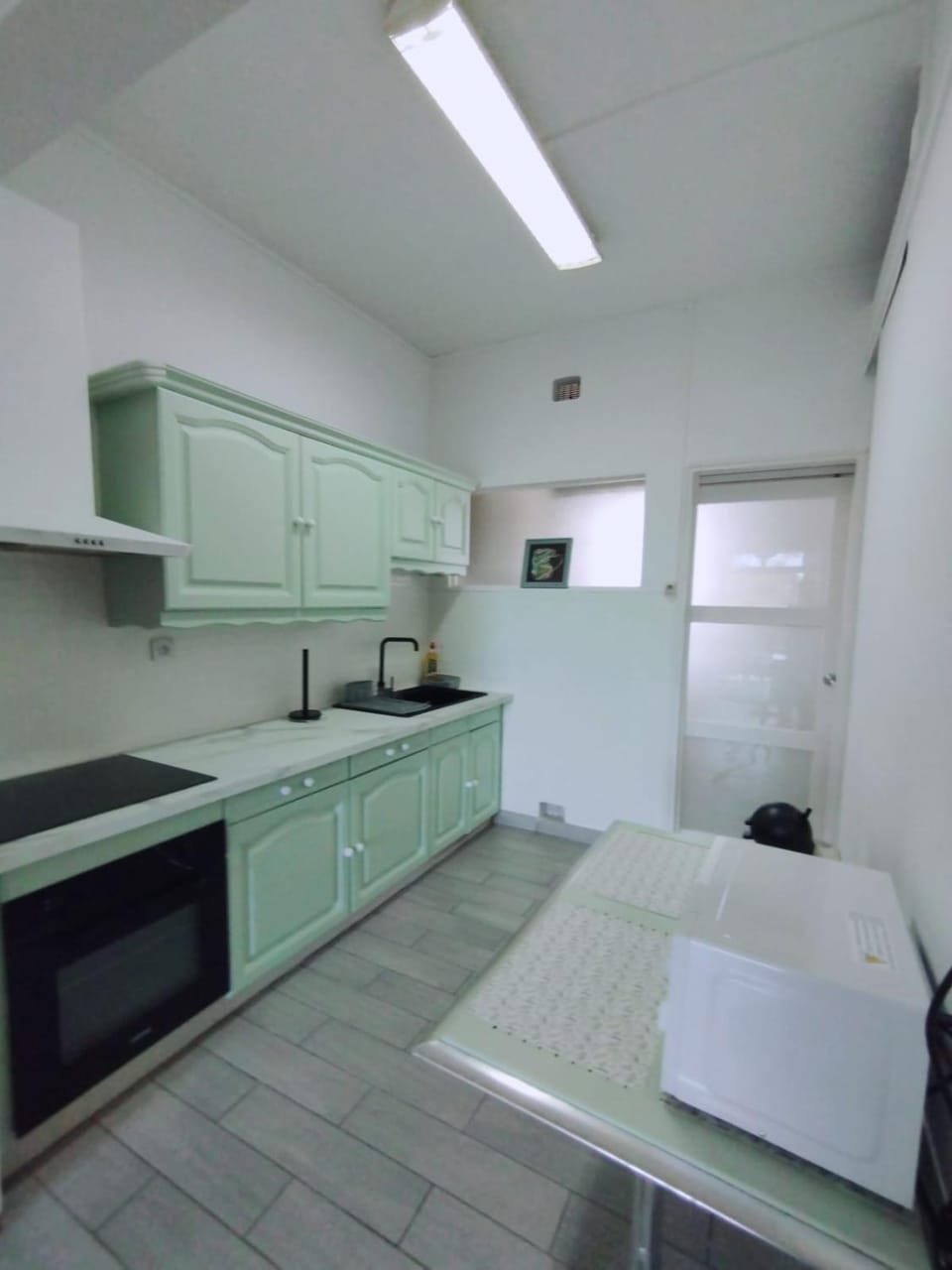 Kitchen or kitchenette, oven, stove