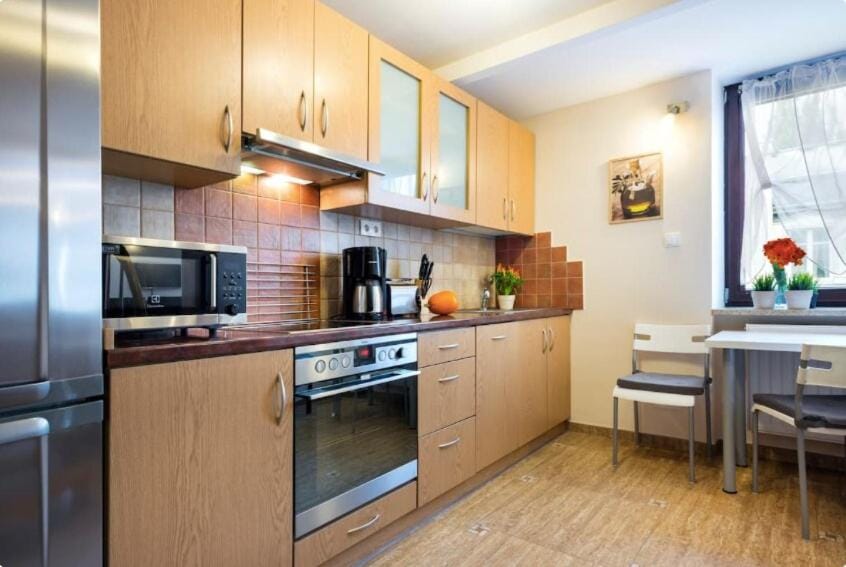 Kitchen or kitchenette, oven, stove, toaster