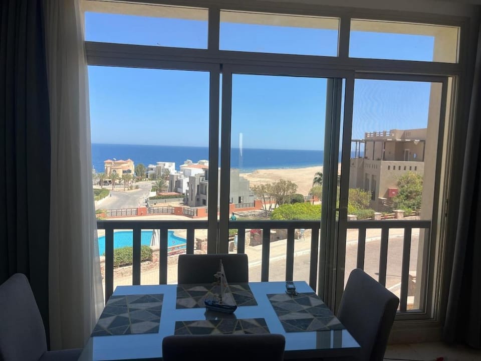 View (from property/room), Dining area, Pool view, Sea view