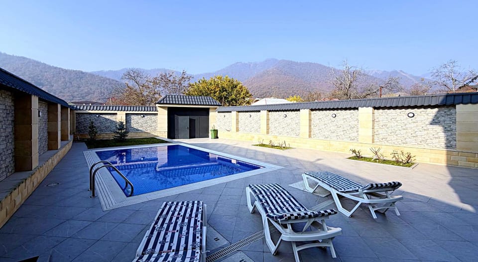 Patio, Day, Natural landscape, Mountain view, Pool view, Swimming pool, sunbed