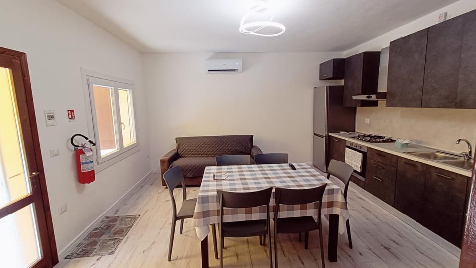 TV and multimedia, Kitchen or kitchenette, Living room, Seating area, Dining area, oven, pet friendly, stove, air conditioner