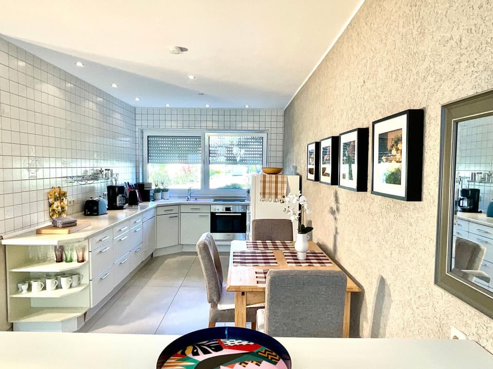 Dining area, dishwasher, oven, stove, kitchen