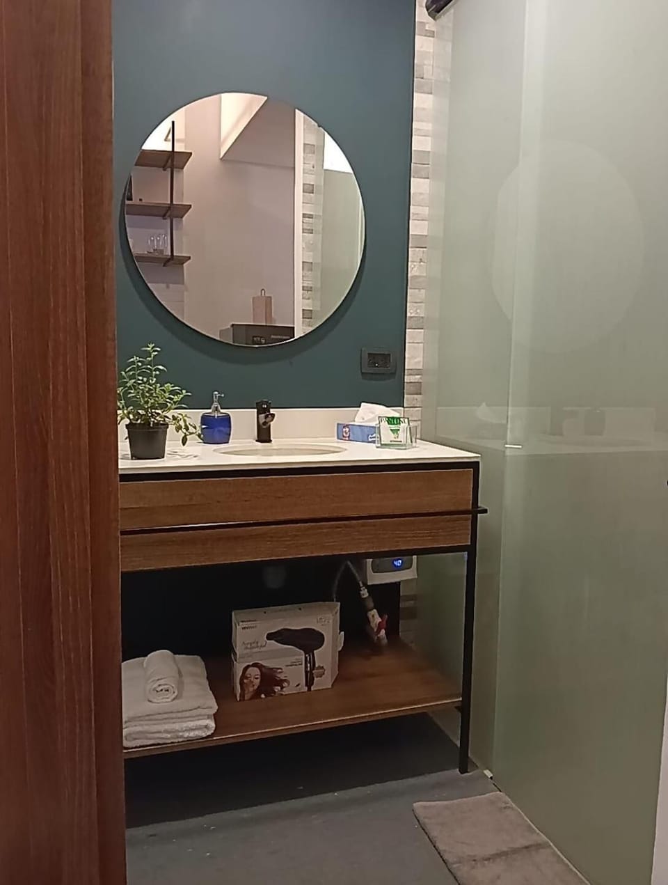 Shower, Bathroom, flat iron, hair dryier, towels