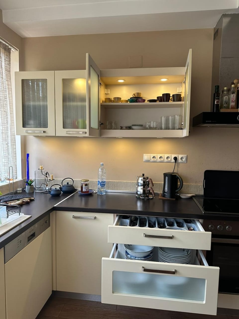Kitchen or kitchenette, dishwasher, oven, stove