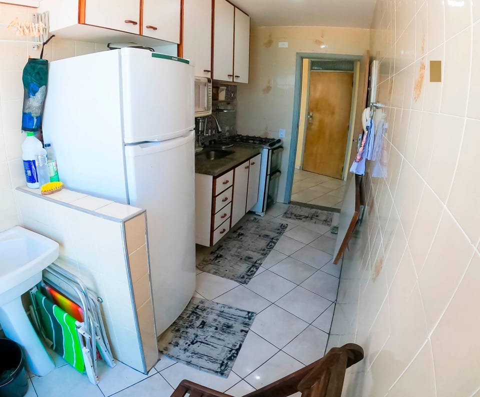 Kitchen or kitchenette, microwave, oven, stove