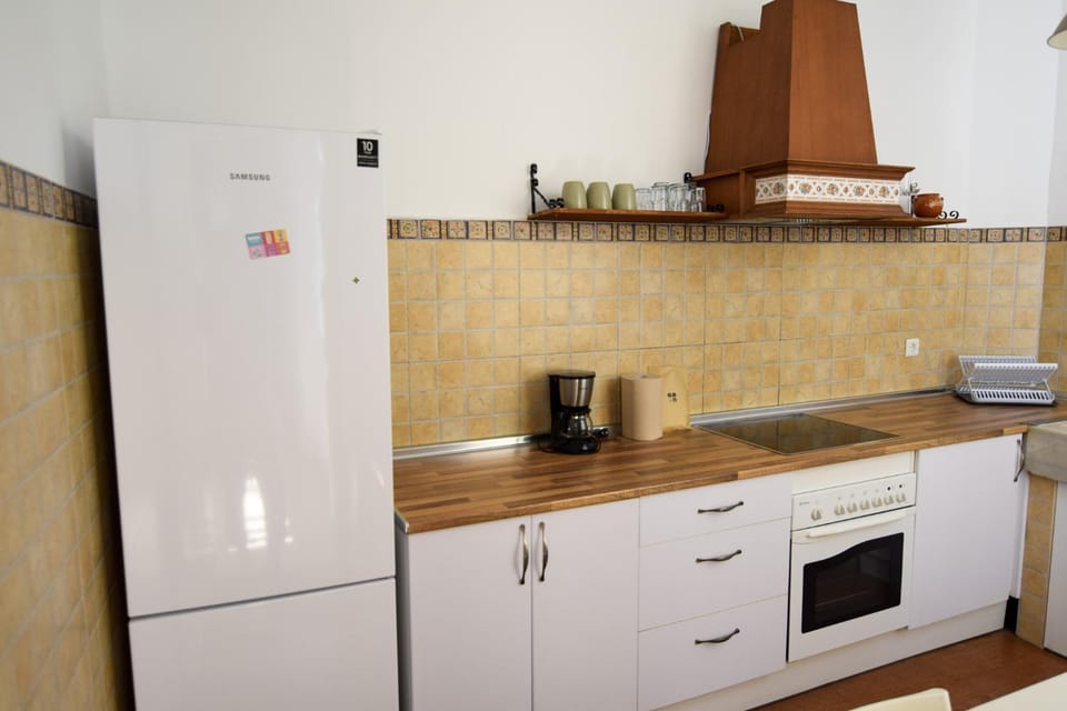 Kitchen or kitchenette, oven, stove