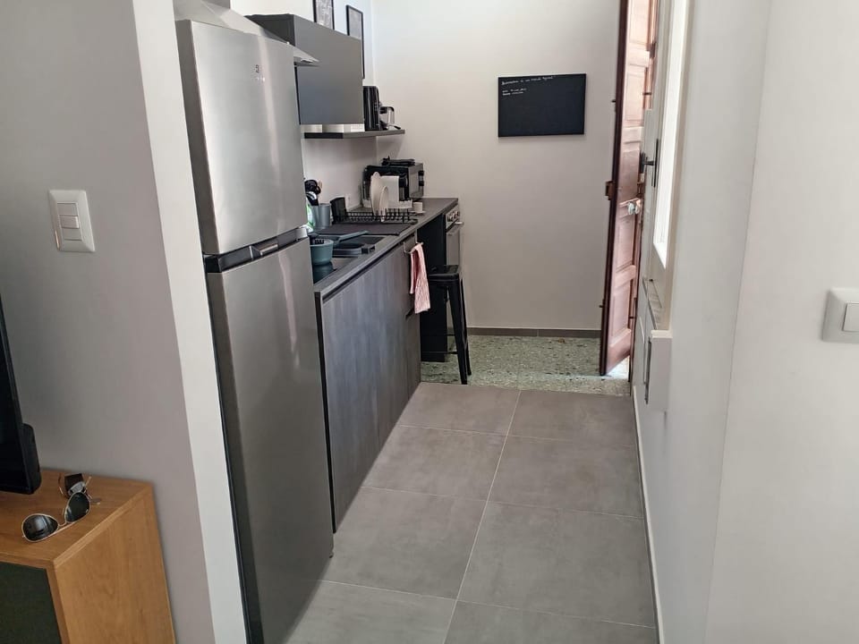 Kitchen or kitchenette, oven, stove