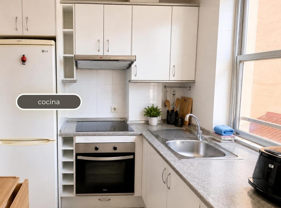 Kitchen or kitchenette, oven, stove, toaster