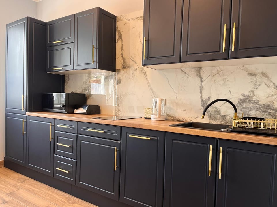 Kitchen or kitchenette, stove