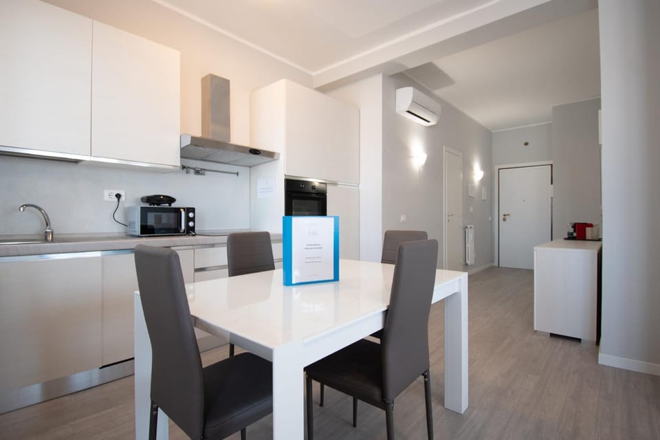 Kitchen or kitchenette, Dining area, oven, stove, toaster, air conditioner
