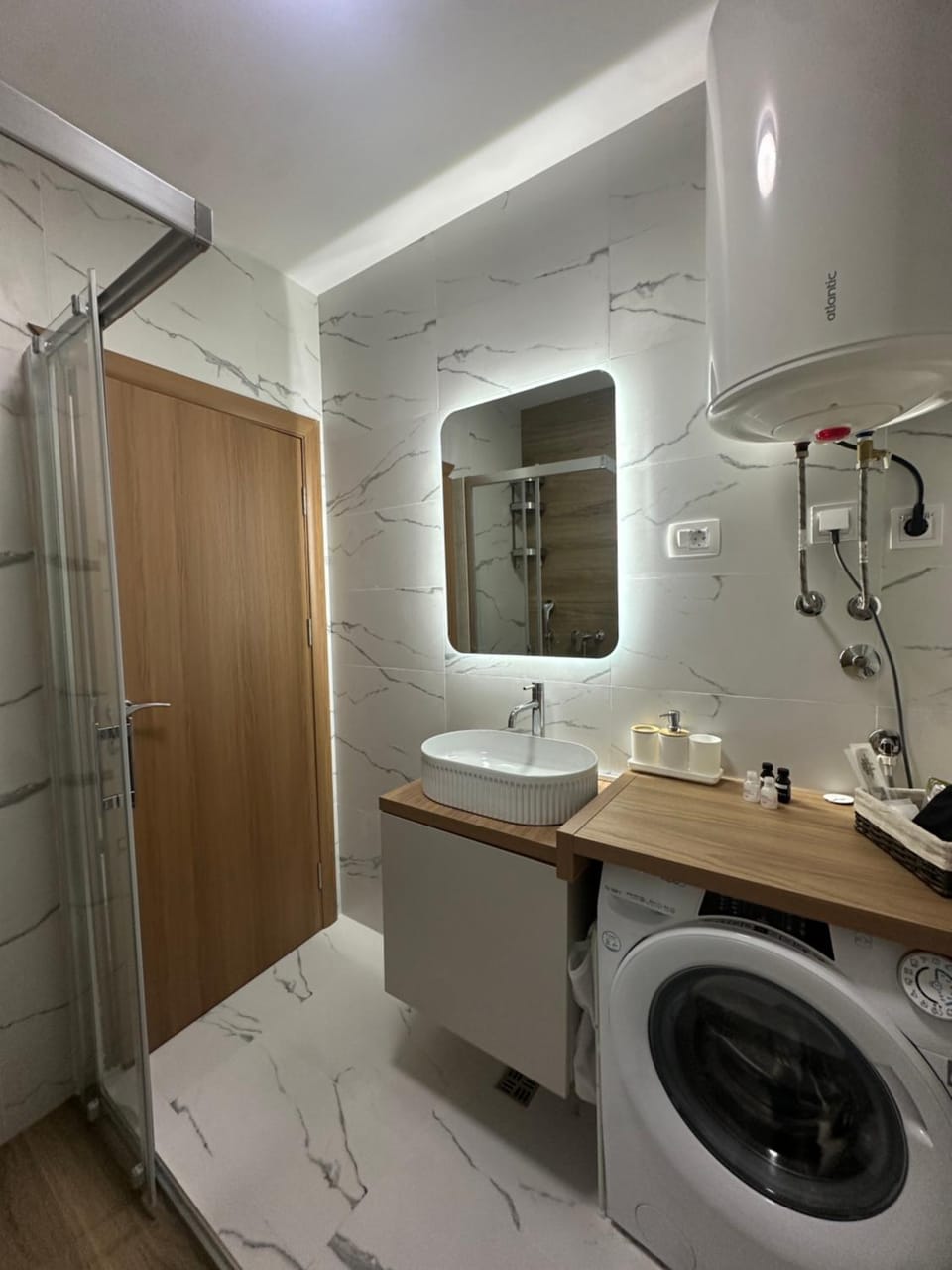 Shower, Bathroom, towels, washing machine, dryer
