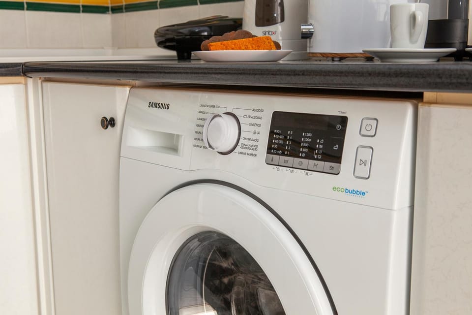 Kitchen or kitchenette, washing machine