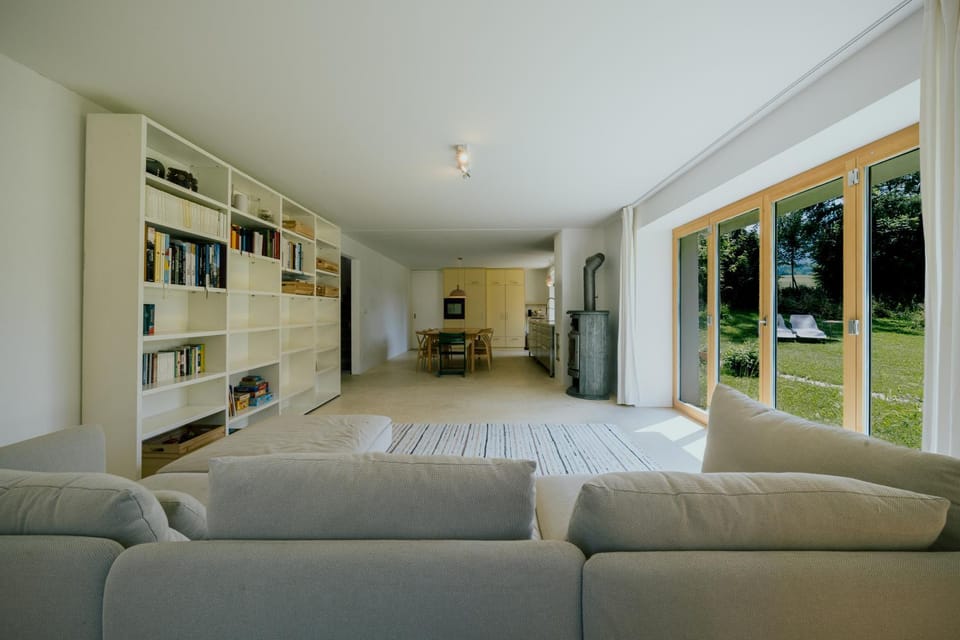 Living room, Seating area, Dining area, Garden view, fireplace, kitchen