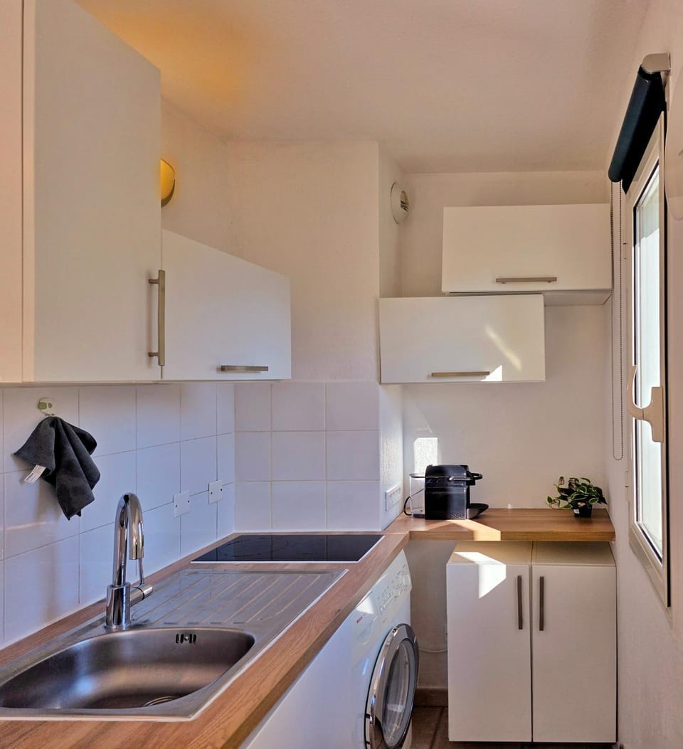 Kitchen or kitchenette, stove