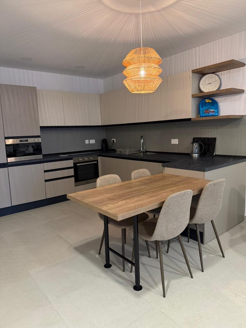 Kitchen or kitchenette, dishwasher, oven, stove, toaster