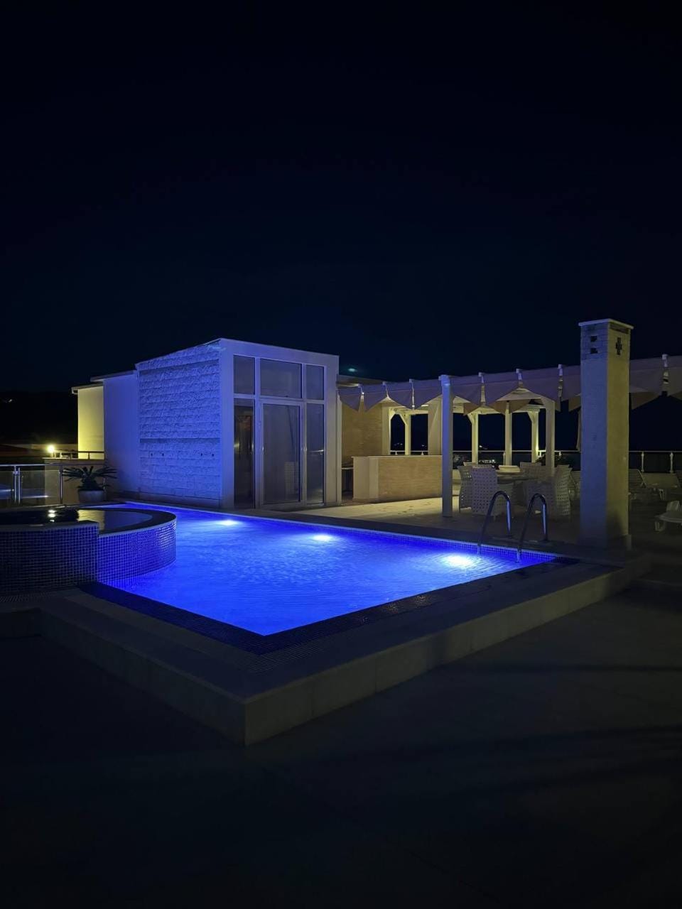 Property building, Night, Pool view, Swimming pool