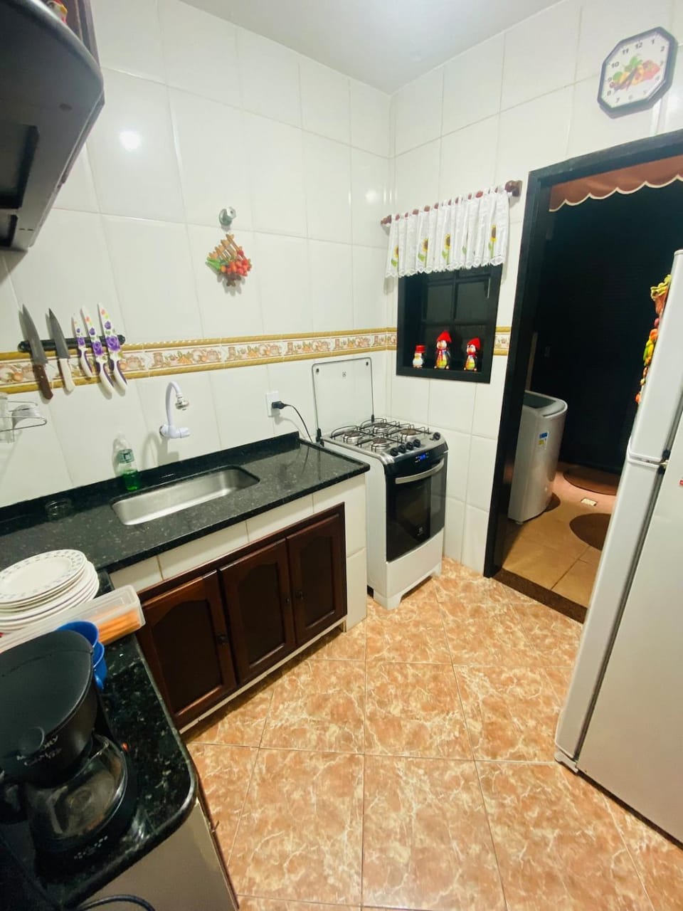 Kitchen or kitchenette, microwave, oven, stove, washing machine