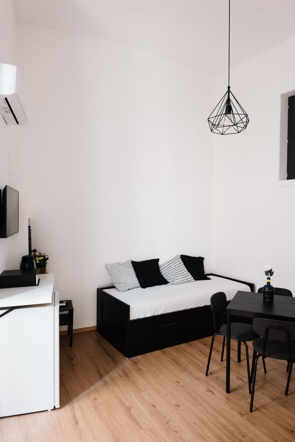 Bed, Living room, Seating area, Bedroom