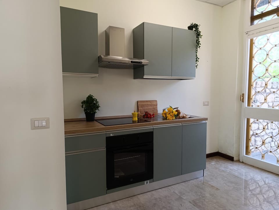 Kitchen or kitchenette, oven, stove