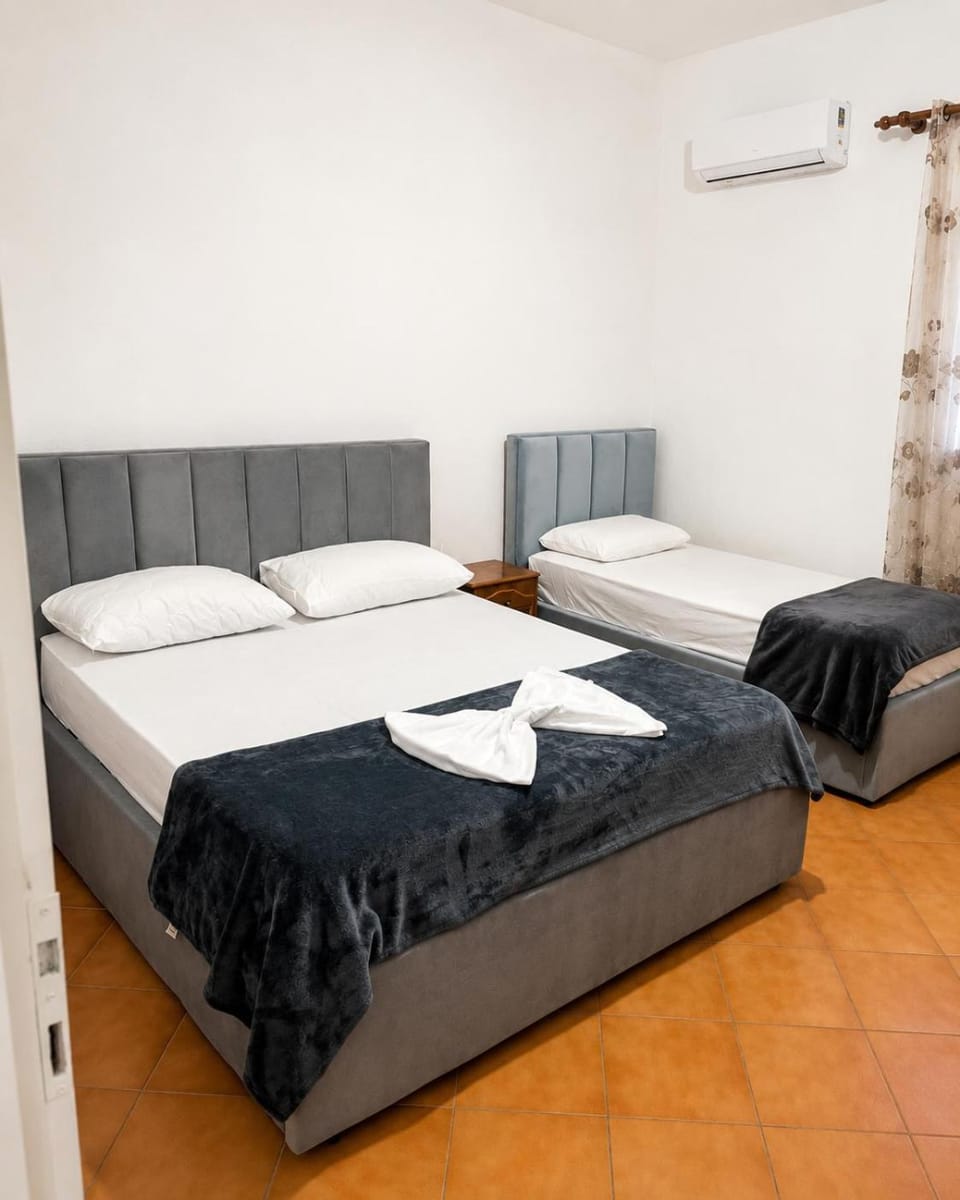 Bed, Photo of the whole room, Bedroom, towels, air conditioner