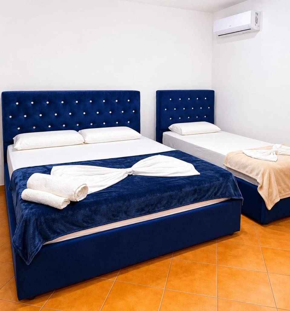 Bed, Photo of the whole room, Bedroom, towels, air conditioner