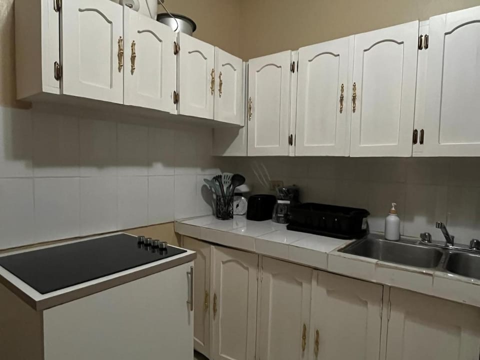 Kitchen or kitchenette, stove