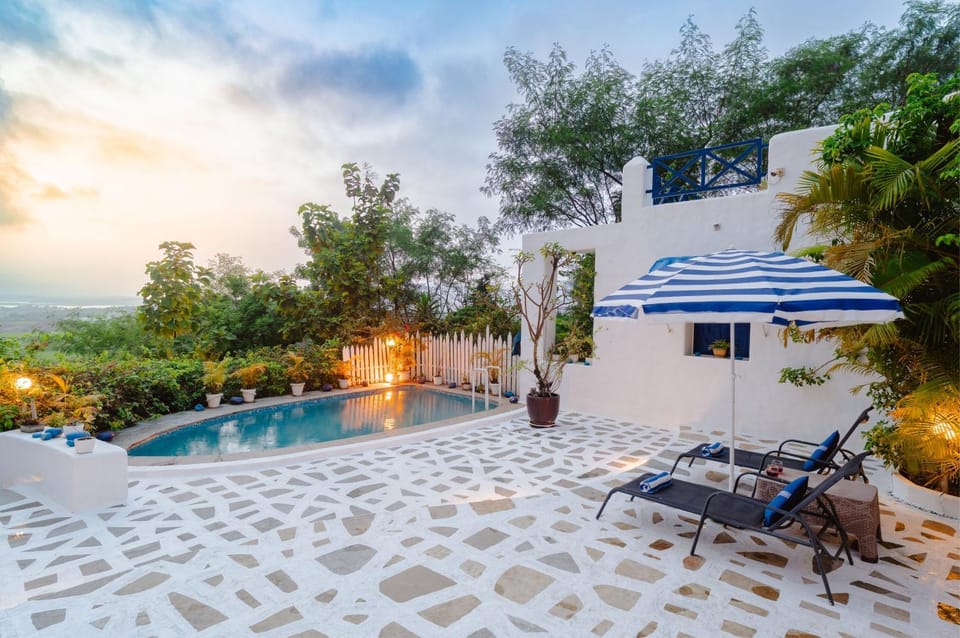 Property building, Day, Natural landscape, View (from property/room), Pool view, Swimming pool, sunbed