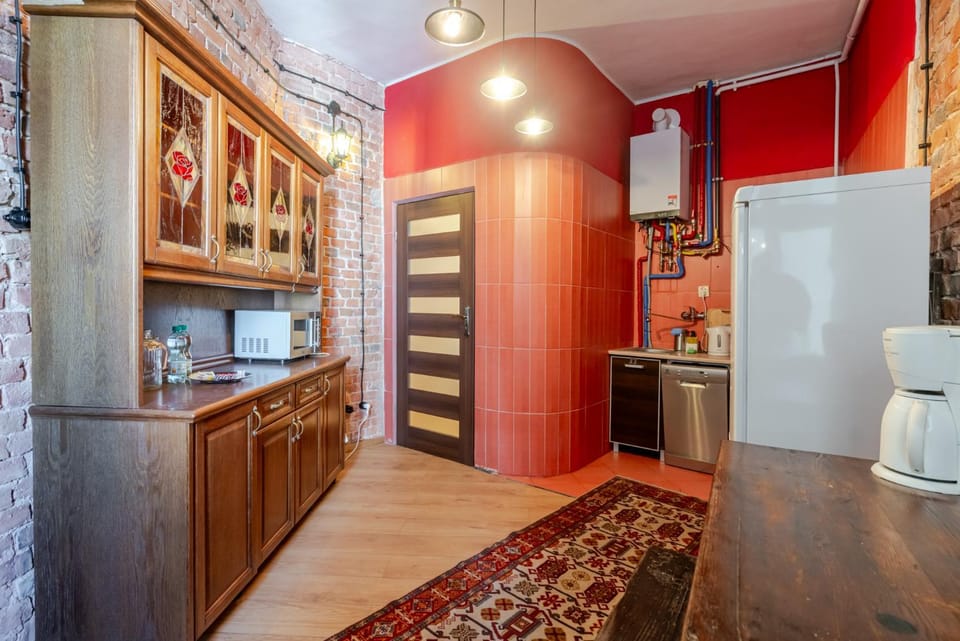 Kitchen or kitchenette, dishwasher, oven, stove