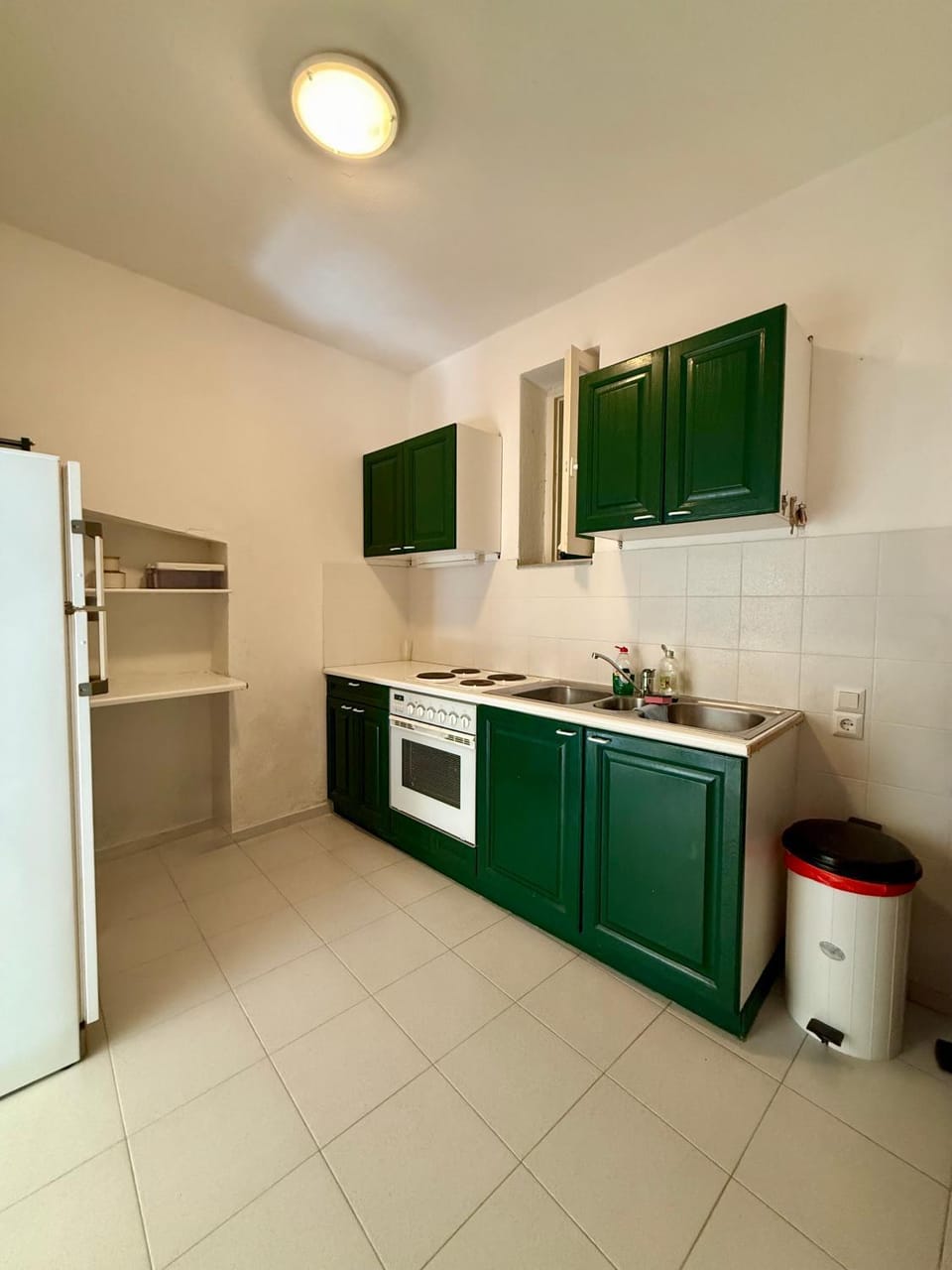 Kitchen or kitchenette, oven, stove