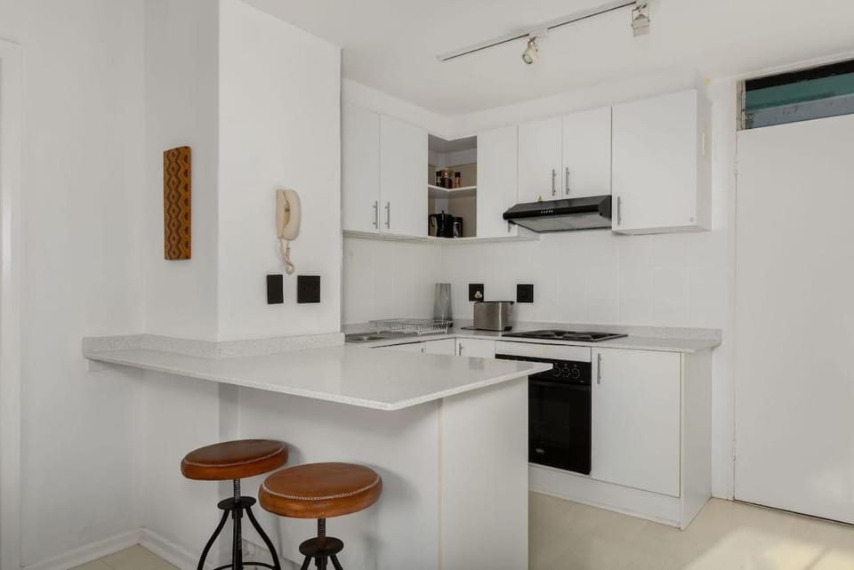 Kitchen or kitchenette, oven, stove