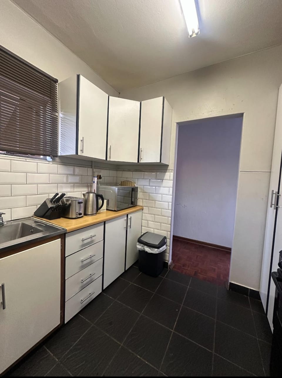 Kitchen or kitchenette, toaster