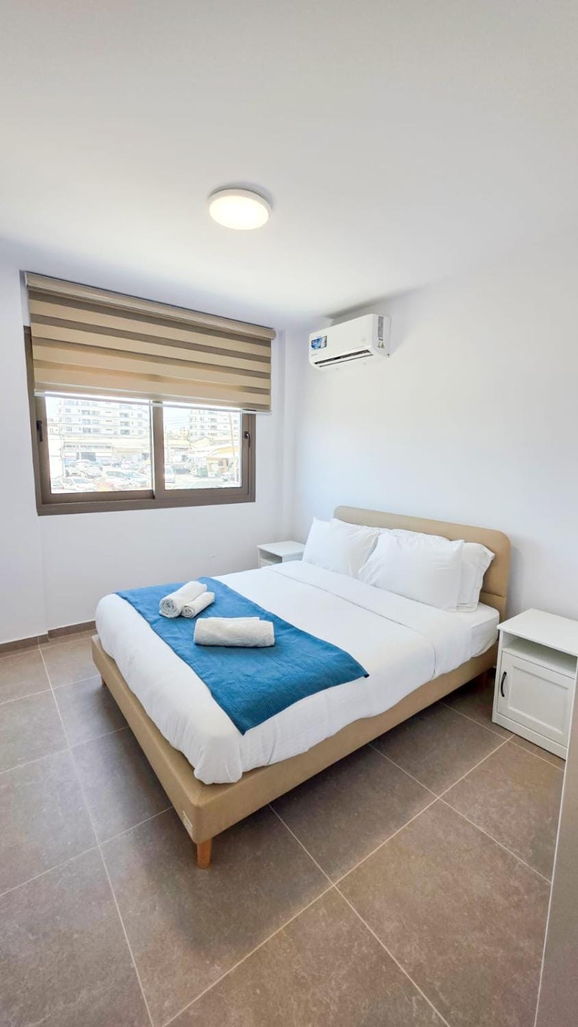 Bed, Photo of the whole room, Bedroom, towels, air conditioner