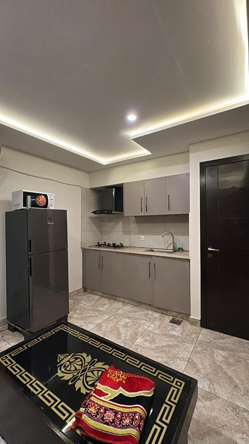 Kitchen or kitchenette, oven